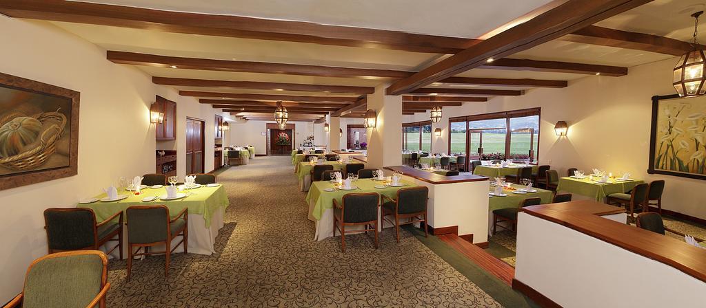 Estelar Paipa Hotel Spa & Y Centro De Convenciones Extérieur photo The restaurant at the clubhouse