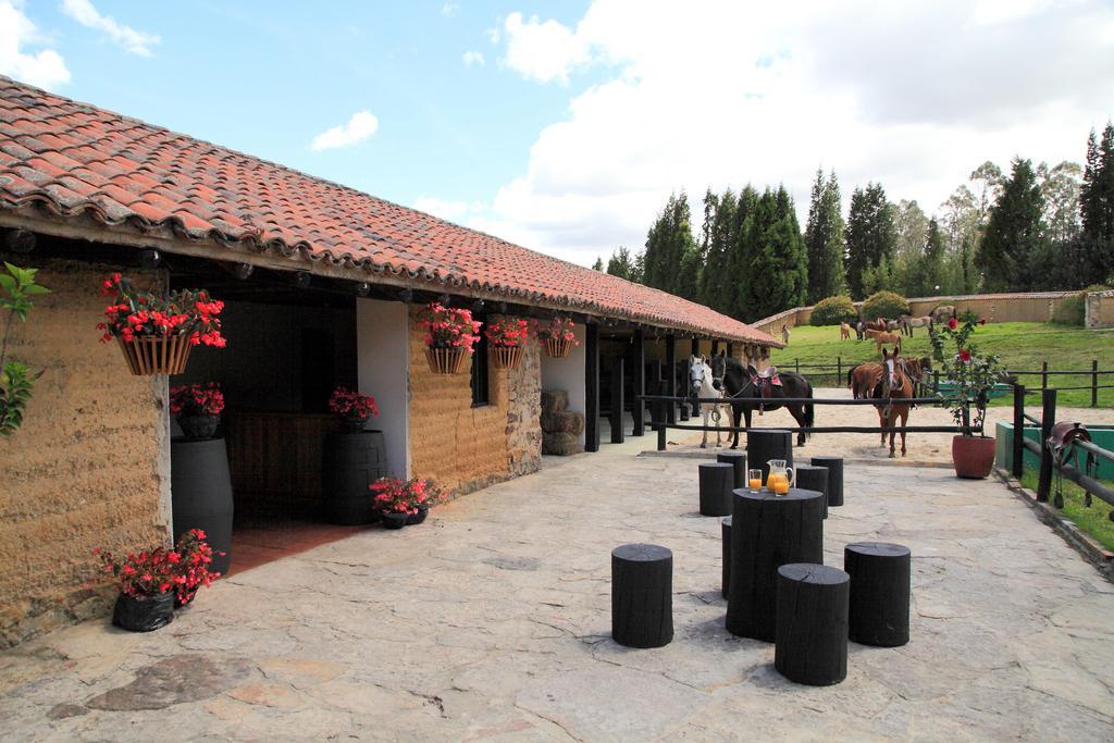 Estelar Paipa Hotel Spa & Y Centro De Convenciones Extérieur photo The stables